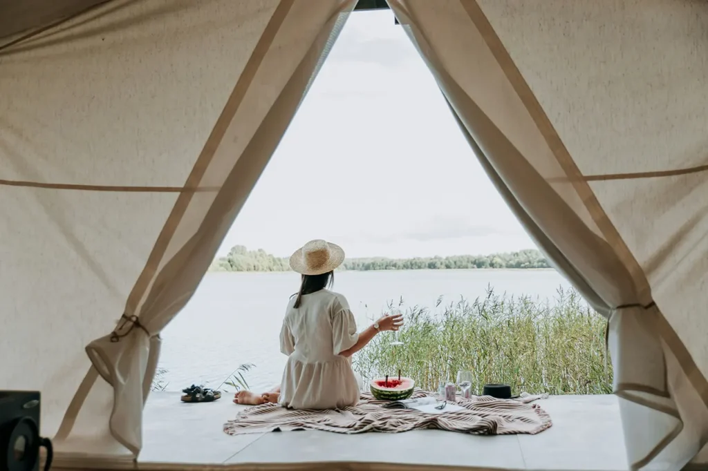 woman wearing white dress glamping-unsplash
